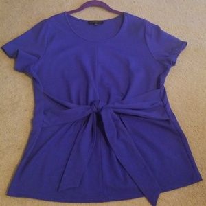 Eloquii peplum top with tie at waistband.